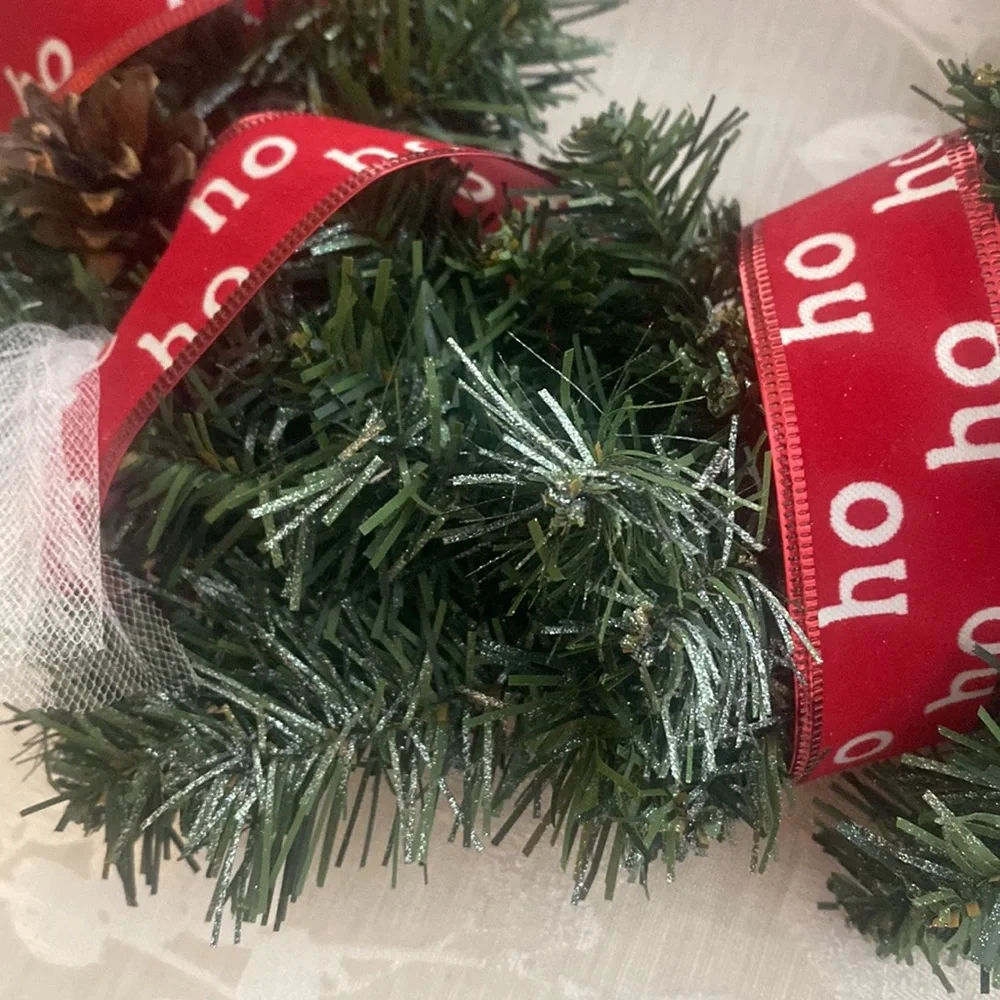 Winter holiday wreath with ho ho ho & BELIEVE adornments evergreen base